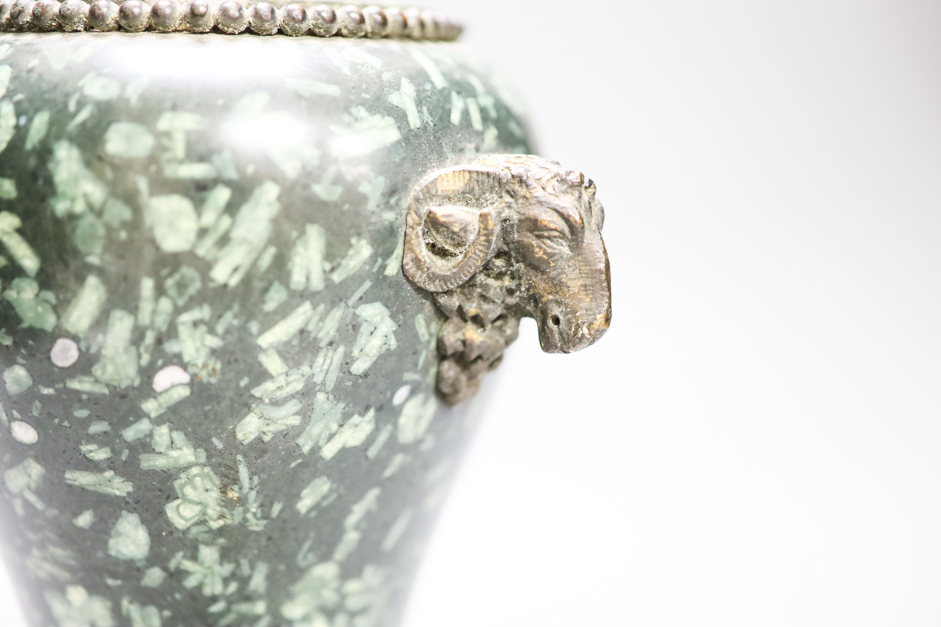 An ormolu mounted green fossil marble ewer, (a.f.) 29cm